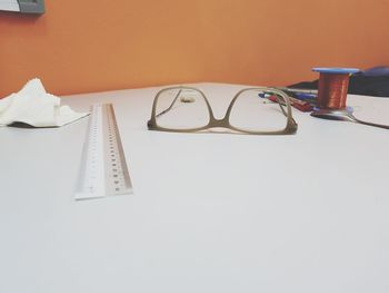 Close-up of eyeglasses on table