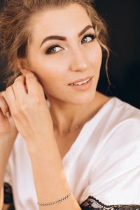 Portrait of a smiling young woman