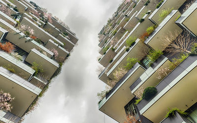 High angle view of buildings in city against sky