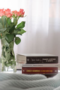 Close-up of flower vase on table