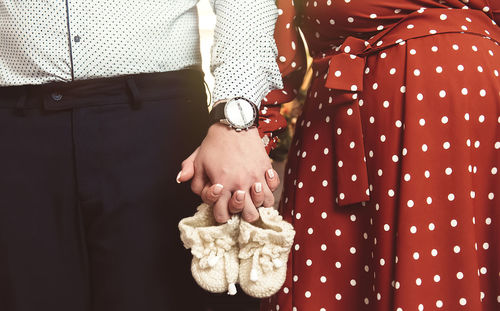 Close-up of woman holding hands
