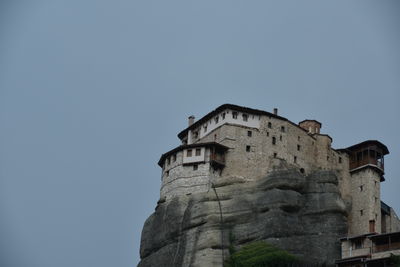 Low angle view of old building against clear sky