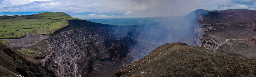 Panoramic view of volcanic landscape against sky