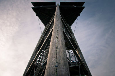 Low angle view of abandoned built structure against sky
