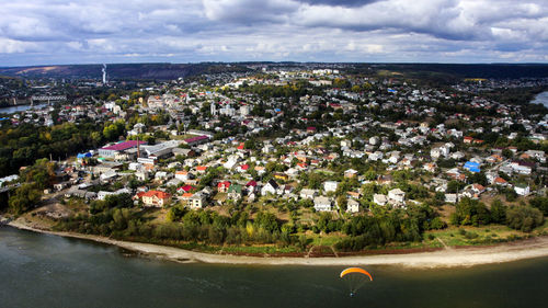 Aerial view of cityscape against sky