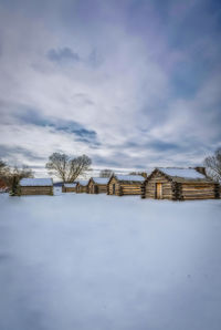 Buildings against sky during winter