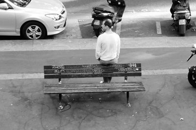 Rear view of woman on road