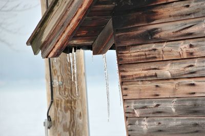 Low angle view of old house against sky