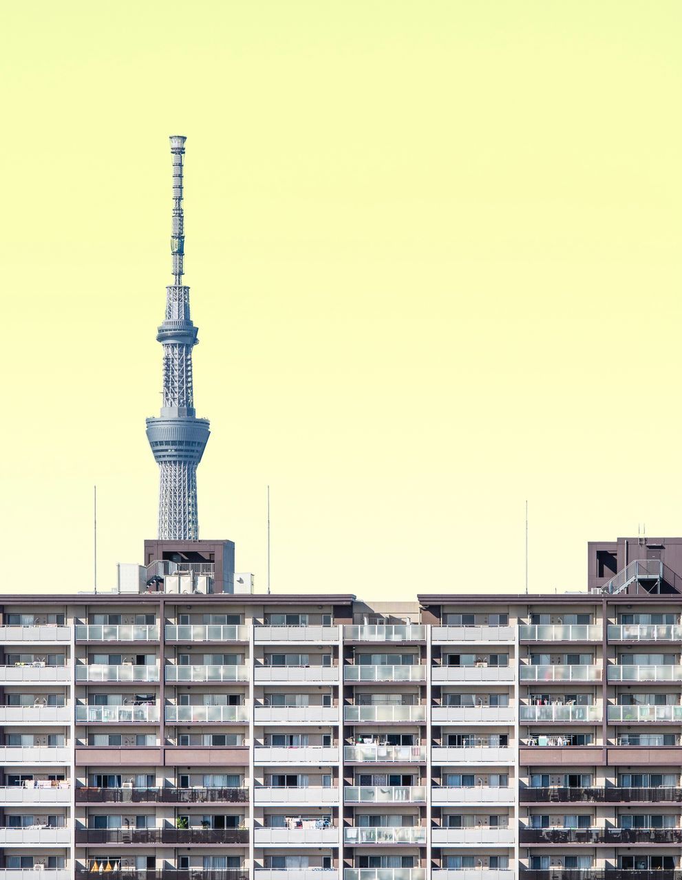 architecture, built structure, building exterior, building, sky, city, clear sky, tower, no people, nature, tall - high, copy space, outdoors, day, residential district, low angle view, industry, office building exterior, modern, travel destinations, skyscraper, spire, apartment