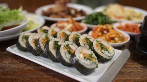 Close-up of sushi served on table