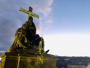 Low angle view of statue against sky