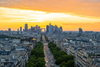 Cityscape against sky during sunset