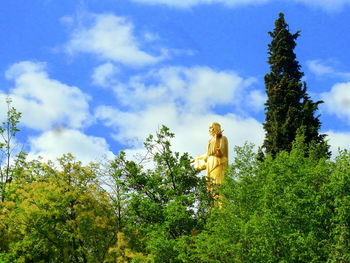 Low angle view of statue against sky