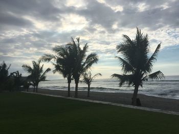 Scenic view of sea against cloudy sky