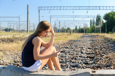 Side view of lonely teenage girl