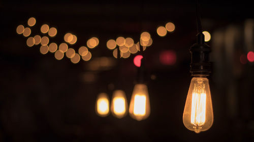 Close-up of illuminated light bulb