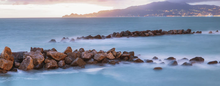 Scenic view of sea against sky during sunset