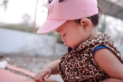 Close-up of cute girl wearing hat