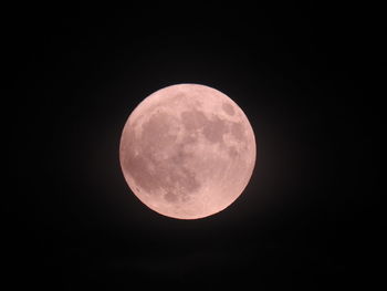 Scenic view of full moon against clear sky at night