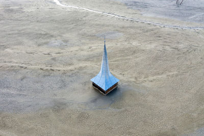 High angle view of sunglasses on beach