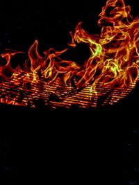 Close-up of fire in the dark