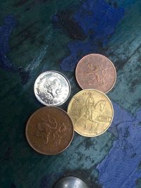 High angle view of coins