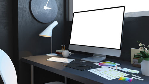 Electric lamp on table at home