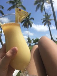 Close-up of hand holding drink