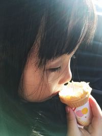 Close-up of girl holding ice cream