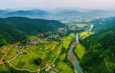 High angle view of agricultural land against sky