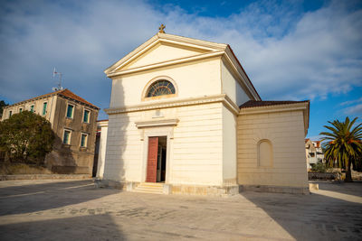 Facade of building against sky