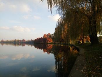 Scenic view of lake against sky during autumn