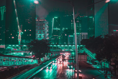 Illuminated city street at night