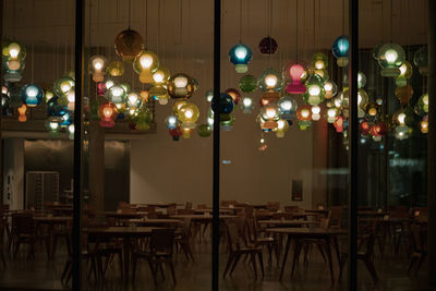 Illuminated lights on table at restaurant