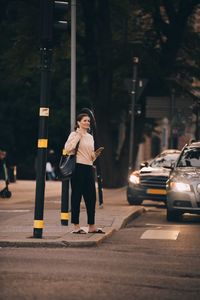 Full length of man standing on road