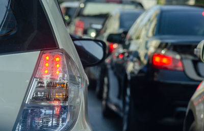 Close-up of traffic on road in city