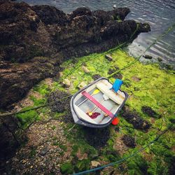 High angle view of boat moored on shore