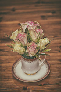 Close-up of roses on table