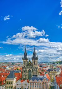 View of townscape against blue sky