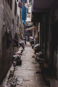 Alley amidst old houses