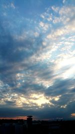 Scenic view of cloudy sky over city