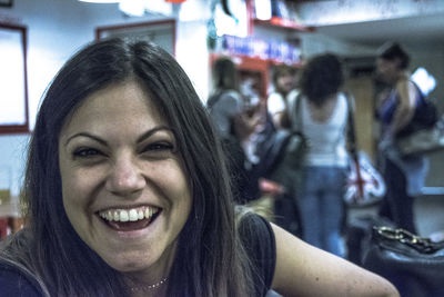 Close-up portrait of smiling woman