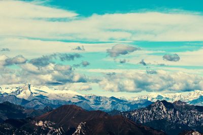 Scenic view of snowcapped mountains against sky