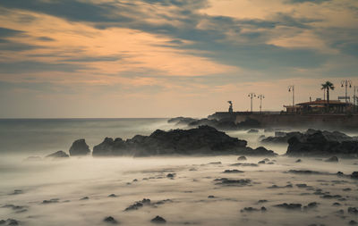 Shoreline scene at a stormy morning in sicily