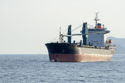 Ship in sea against clear sky