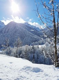 Scenic view of snow covered mountains