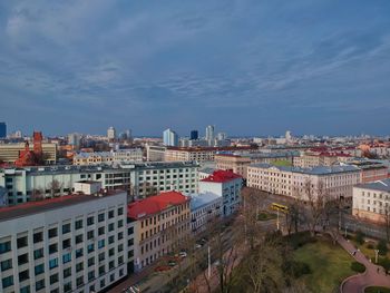 High angle view of buildings in city against sky