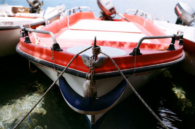 Boat moored at harbor