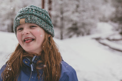 Portrait of girl in snow