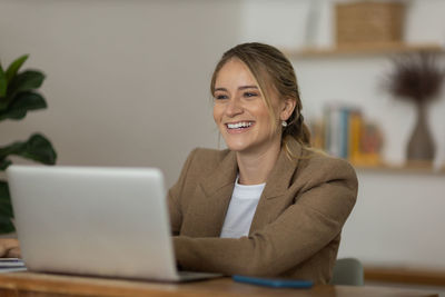 Woman working at home with laptop. home office.  notebook for working. 